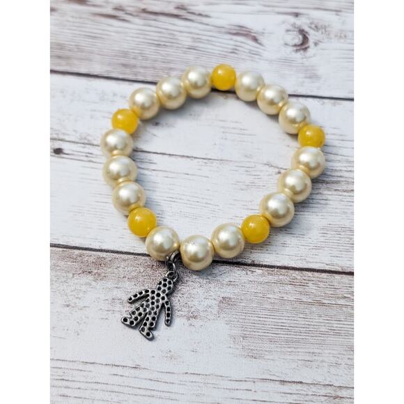 Vintage Stretch Bracelet - Cream & Yellow with Man Charm - Picture 1 of 5